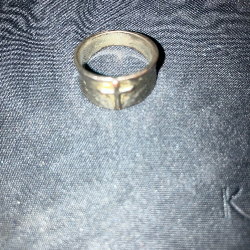 Elegant Silver Ring with Cross Detail